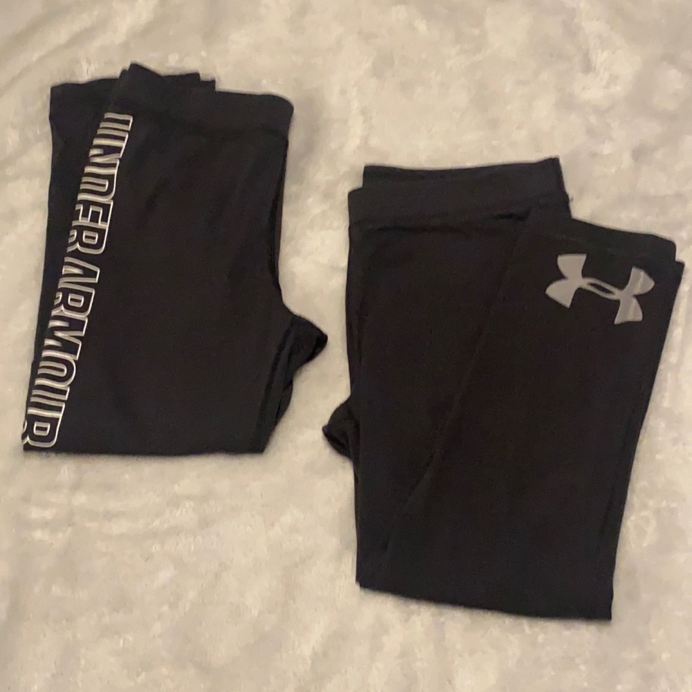 2 pair of women’s Under Armour capri leggings. Like new, size XS- Black